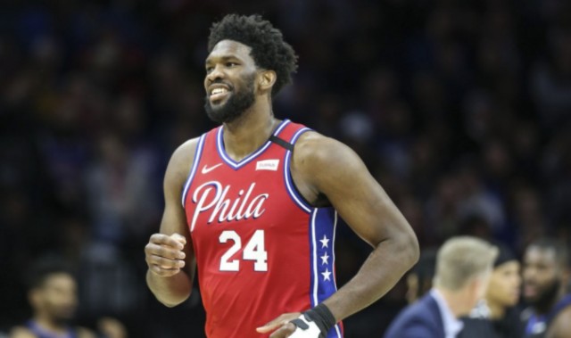  恩比德内线称霸76人力克热火止连败